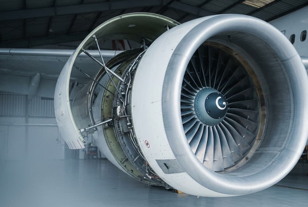 Commercial jet engine in a maintenance hangar