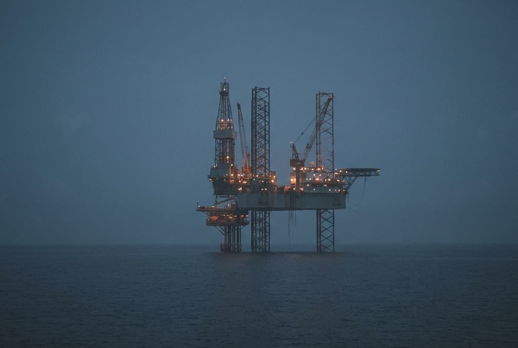 Offshore oil and gas platform at dusk